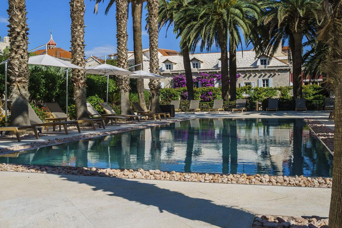 <b>Hotel Lemongarden, Brac</b> - Located right on the harbor of Sutivan, the Hotel Lemongarden is comprised of multiple 300-year-old stone houses with ample space to ensure a peaceful stay. This hidden gem is an adults-only property that features a private beach area, a pool nestled within a lush sculptured garden, and a dining room colored in yellow and lime - making nods to the hotel’s name.