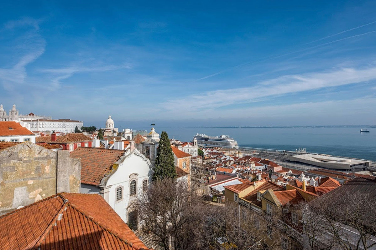 <b>Santiago de Alfama</b> - Within a former palace from the 15th century, this charming boutique hotel is a 9-minute’ walk to the Castelo de Sao and a 13-minute walk to the waterfront plaza Terreiro do Paco. The restaurant serves regional cuisine, the terrace is elegantly furnished, and the rooms have wood floors and paneled ceilings, giving it an overall classic feel.
