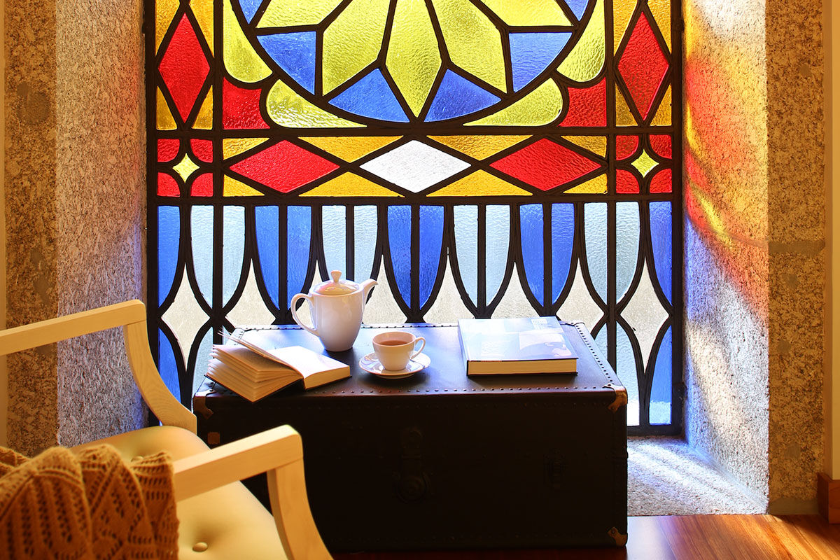 <b>Solar Egas Moniz - Charming House & Local Experiences, Paco de Sousa</b> - This manor-house hotel shows off its sophistication with a stained-glass window, climbing vines, and a wine bar. The rooms are individually decorated with murals, the library has a wood-burning stove and the garden is home to a swimming pool and a kids’ playground.