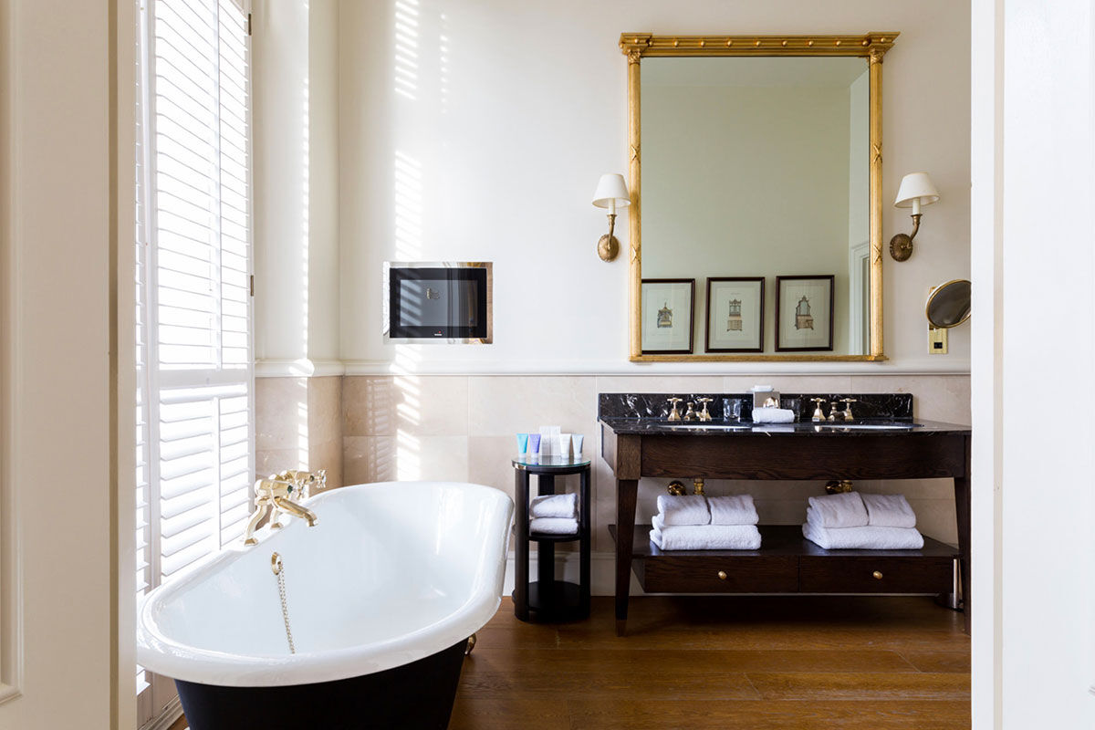 <b>The Kensington Hotel</b> - Within the affluent district of South Kensington sits a grand hotel with a white stucco façade, high ceilings and a bowler-hatted doorman ready to offer his hand. With a genteel, service-oriented approach, the Kensington Hotel gives guests a chic, cosmopolitan experience within vibrant London society.