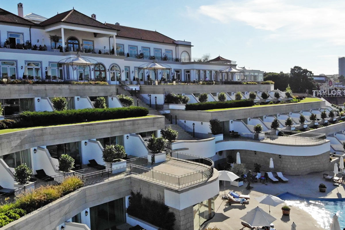 <b>The Yeatman Hotel</b> - Distinguished with a two Michelin-starred restaurant, this luxury wine hotel & spa is set in the beautiful historic district of Vila Nova de Gaia. Walk past the distinctive arches on the patio and head to the bar or wine cellar for a taste of the region.