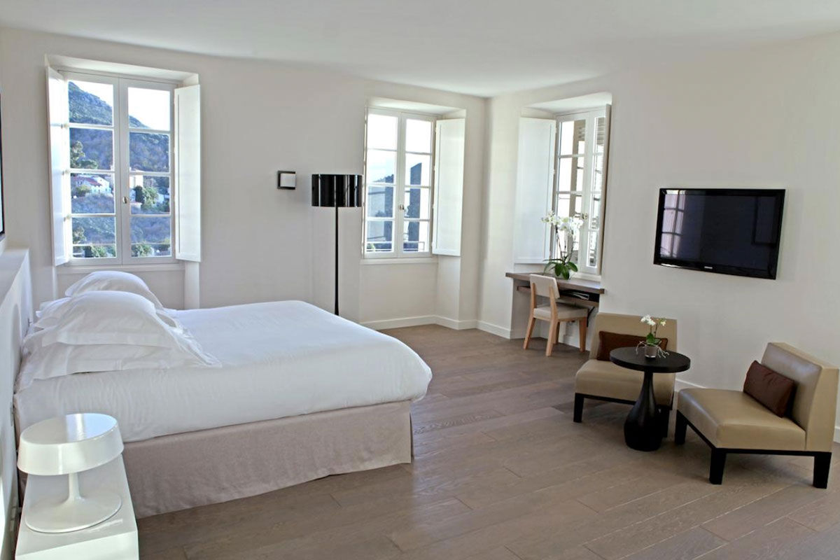 <b>U Palazzu Serenu Hotel, Oletta</b> - Featuring artworks and sculptures throughout the property, this 17th century Florentine-inspired villa is contemporary and sleek. With views of the mountains and sea from the pool, you’ll never want to leave its stone terrace.