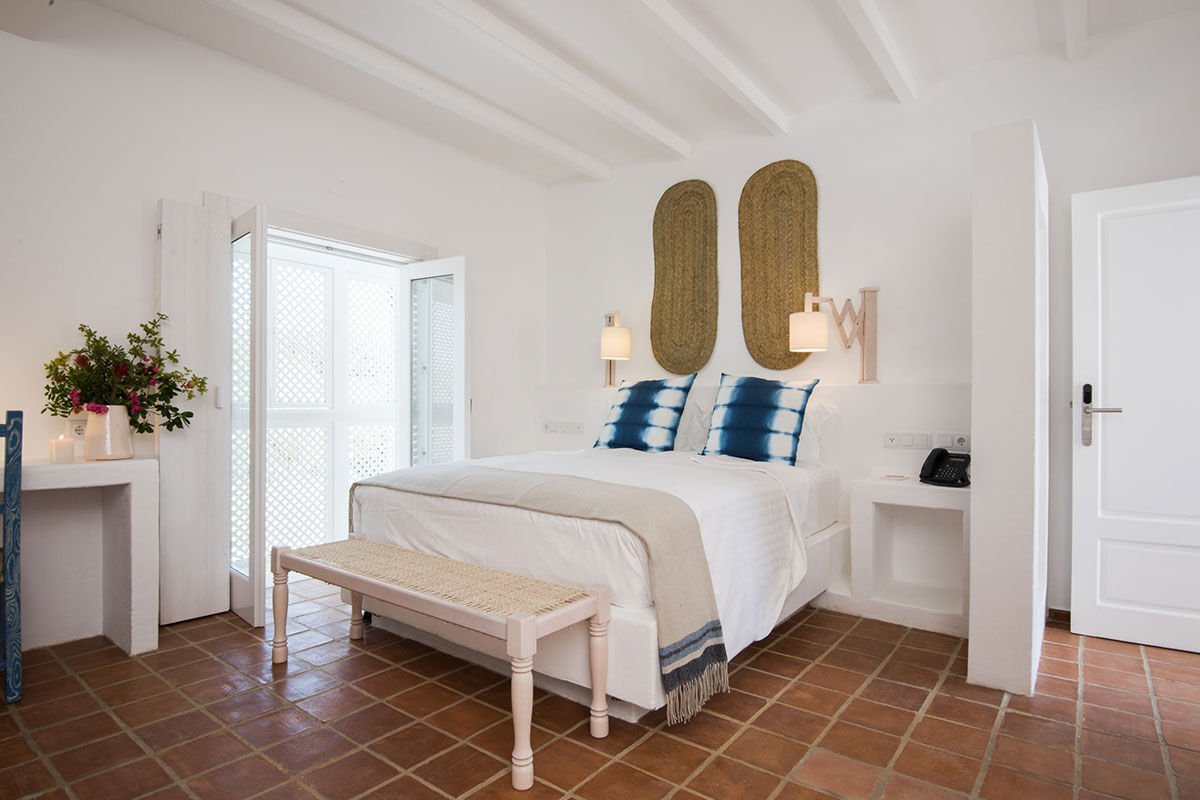 <b>Vila Monte Farm House, Moncarapacho</b> - A whole new level of luxe is introduced at this charming boho villa, inspired by traditional Algarve buildings. Surrounded by citrus trees, the Vila Monte Farm House offers a tranquil retreat for travelers who love lounging by the pool, admiring flowers in the garden and getting cozy by the fireplace.