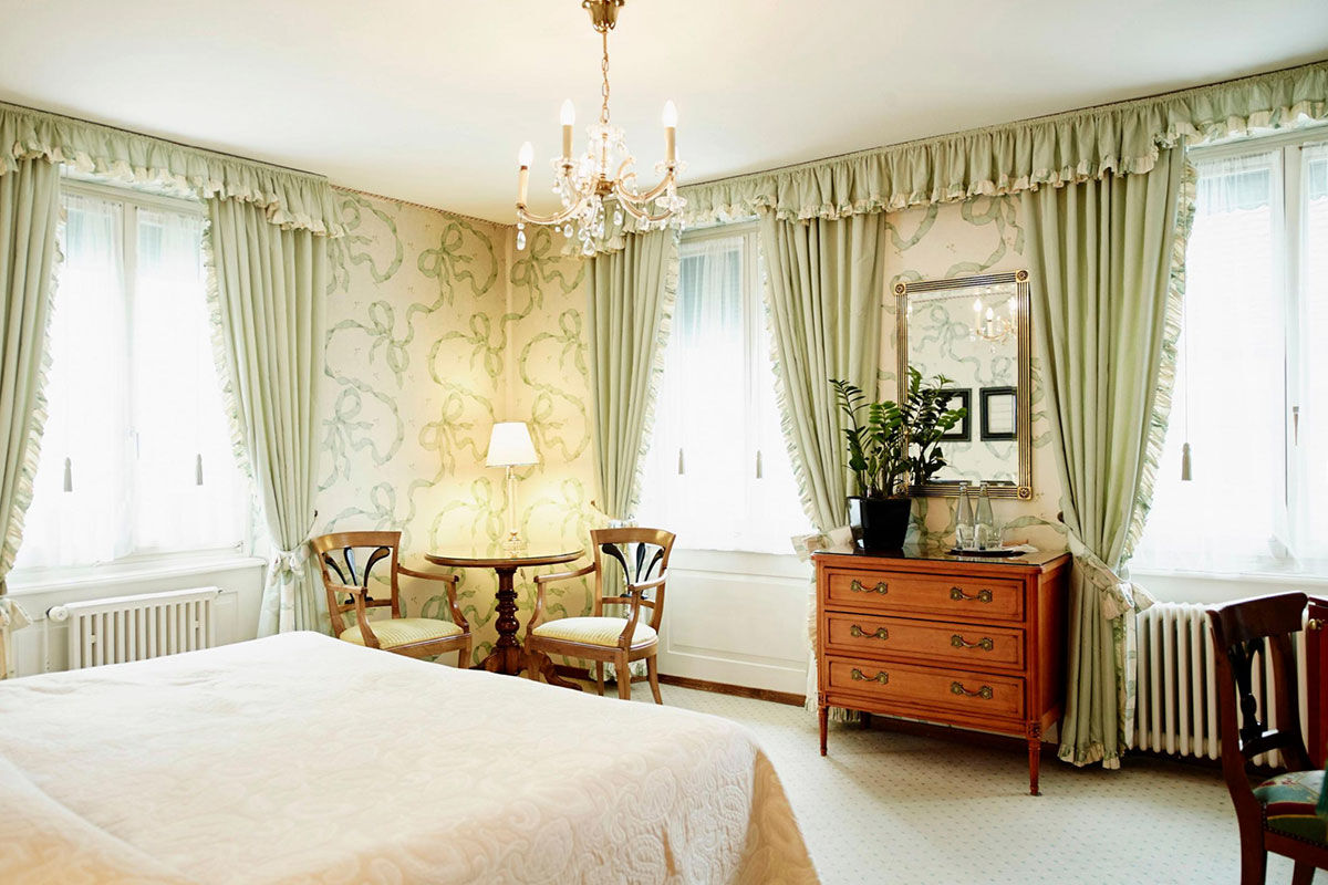 <b>Wilden Mann</b> - Welcome to the Old World as you step off the knobby cobblestone street and into this 19th century building-turned-boutique hotel. Inside you’ll find a cozy, rustic bistro with exposed wooden beams, an upscale French restaurant and country-chic rooms with antiques furnishings, giving the atmosphere a warm, charming feel.