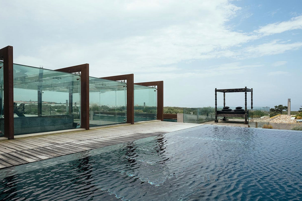 <b>Areias Do Seixo, A dos Cunhados</b> - Only a 10-minute walk to the Praia da Mexilhoeira beach, this industrial-chic hotel marries contemporary sophistication with authentic bohemian touches. Guests choose this eco-conscious beach retreat for its scenic terraces, impeccable design and infinity pool.
