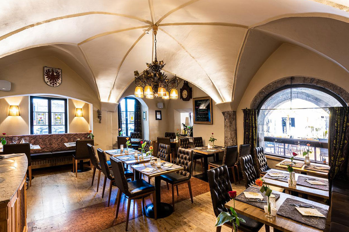 <b>Best Western Plus Hotel Goldener Adler</b> - With only a minute’s walk to the Goldenes Dachl Museum and a 3-minute walk to the Hofburg Palace, this 14th century hotel is charming and polished. The dining room features vaulted ceilings, the bar has original exposed brick, and the cuisine is focused on Tyrol and Austrian specialties.