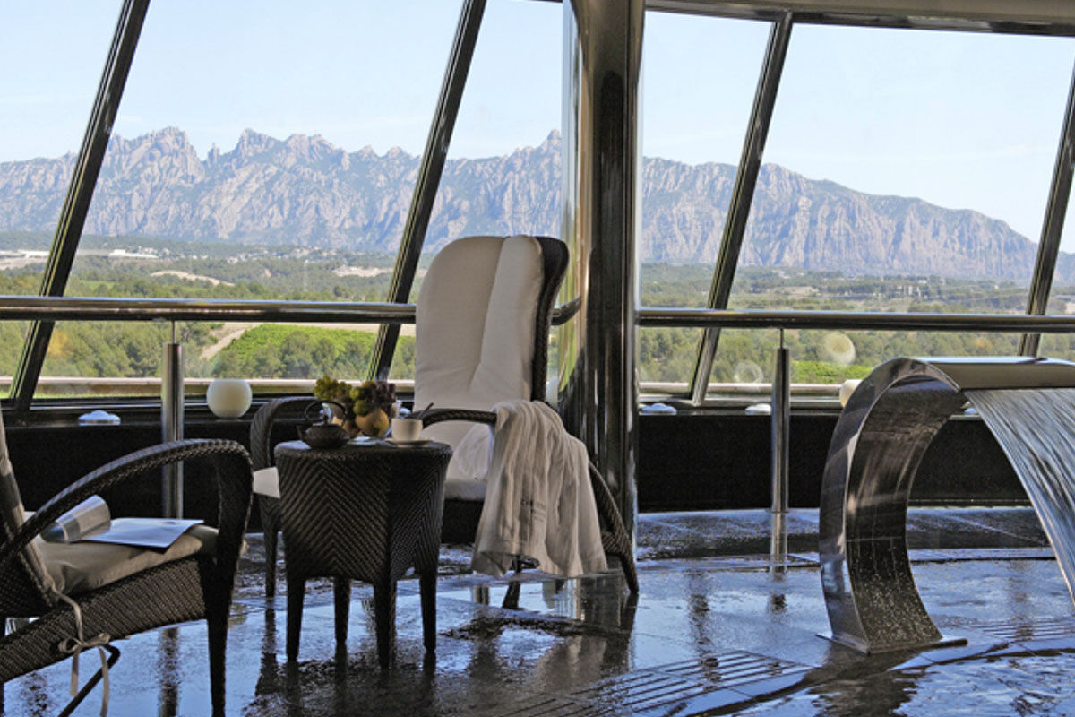 <b>Can Bonastre Wine Resort, Masquefa</b> - Boasting over 460 years of wine history and set in a 16th century farmhouse, the Can Bonastre Wine Resort sits below the Monteserrat mountain range and is surrounded by vineyards. Wander from your polished room, head past the chic spa and sauna, meander through the landscaped gardens, and arrive just in time for your wine tasting tour.