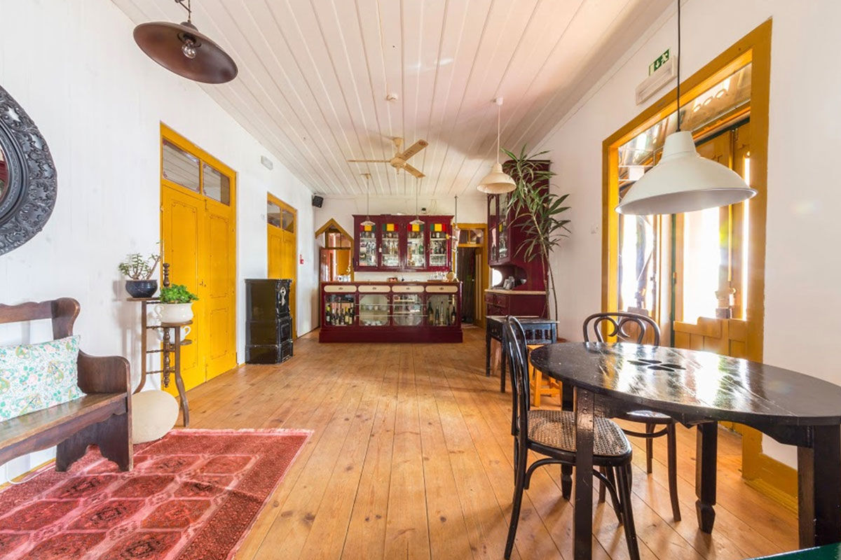 <b>Casa Paco D’Ilhas, Ericeira</b> - With heritage styling and a bright, colorful palette, the Casa Paco D’Ilhas immerses guests in a holistic leisure approach to life. With cabanas overgrown with tropical plants, a white stone pool, and décor with a rustic edge, this quaint hotel provides guests with an authentic experience - the perfect ocean getaway.