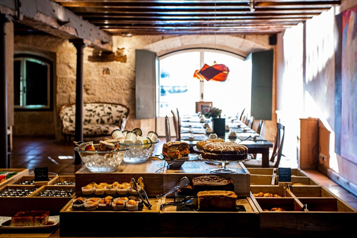 <b>Hacienda Zorita, Salamanca</b> - What once was an ancient Dominican monastery of the 14th century, Hacienda Zorita is a wine hotel and organic farm located on the River Tormes and is surrounded by countryside and vineyards. Taste the small batch wines, savor local cuisine, and admire the exposed wooden beams, stone walls, and almost-Tuscan finishes.