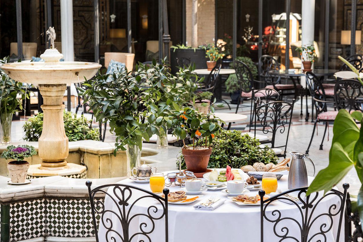 <b>Alfonso XIII</b> - Built in 1929, this grand hotel in the city center is only a 10-minute walk from the Alcazar Royal Palace. It features rooms that blend contemporary and traditional Spanish décor, as well as an outdoor pool, upscale restaurant and tapas/cocktail bars.