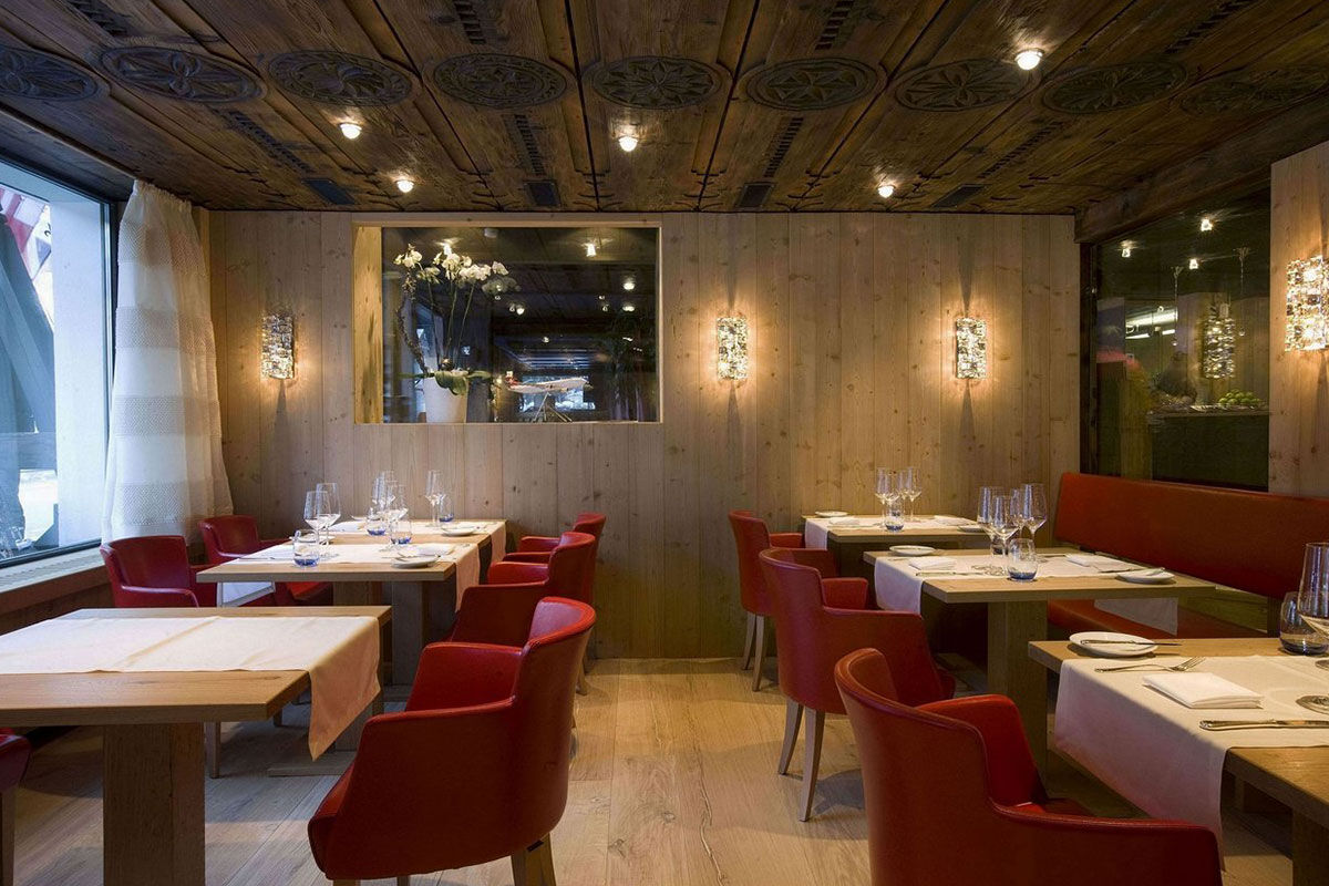 <b>Hotel Alpenhof</b> - With dark wood-beamed ceilings, rustic-chic rooms, piano bar and cigar lounge, this handsome hotel sits at ease amidst the Swiss Alps with views of Matterhorn. Family-run and only a 5-minutes’ walk to downtown Zermatt, this chalet-style hotel is the perfect, upscale cabin-like feel for your rugged mountain stay.