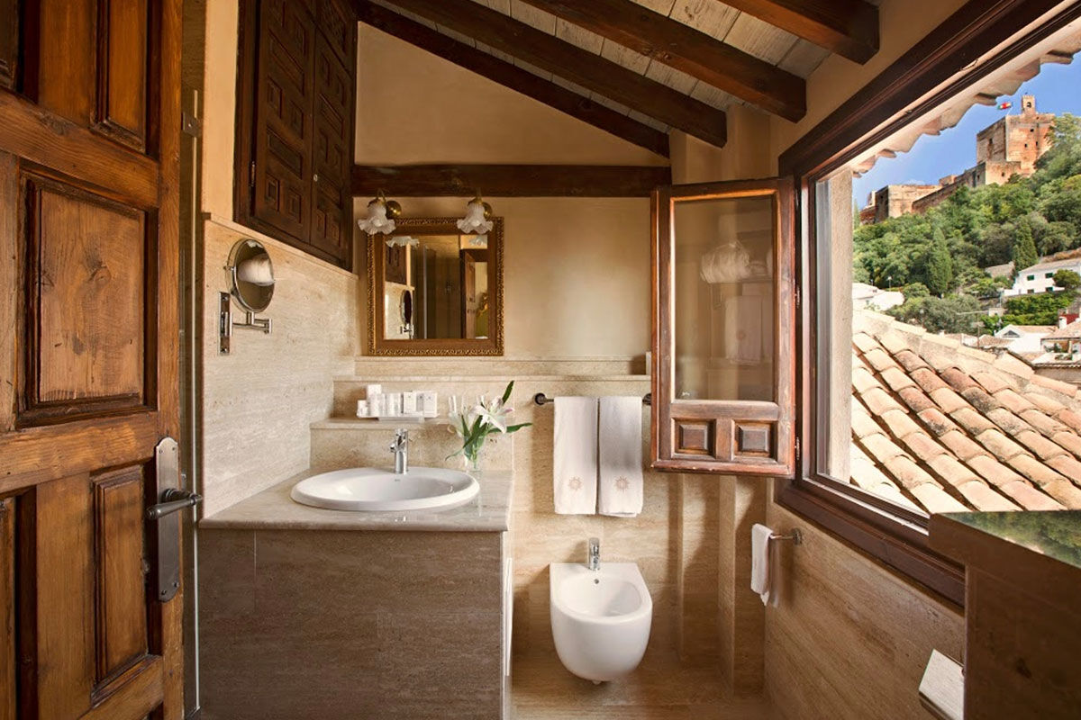 <b>Hotel Casa 1800 Granada</b> - A 6-minute walk to the Granada Cathedral, this upscale hotel is housed in a charming 16th century building with original wooden beams. Rooms are elegantly decorated, and the enclosed patio and lounge are comfortable places for guests to relax.