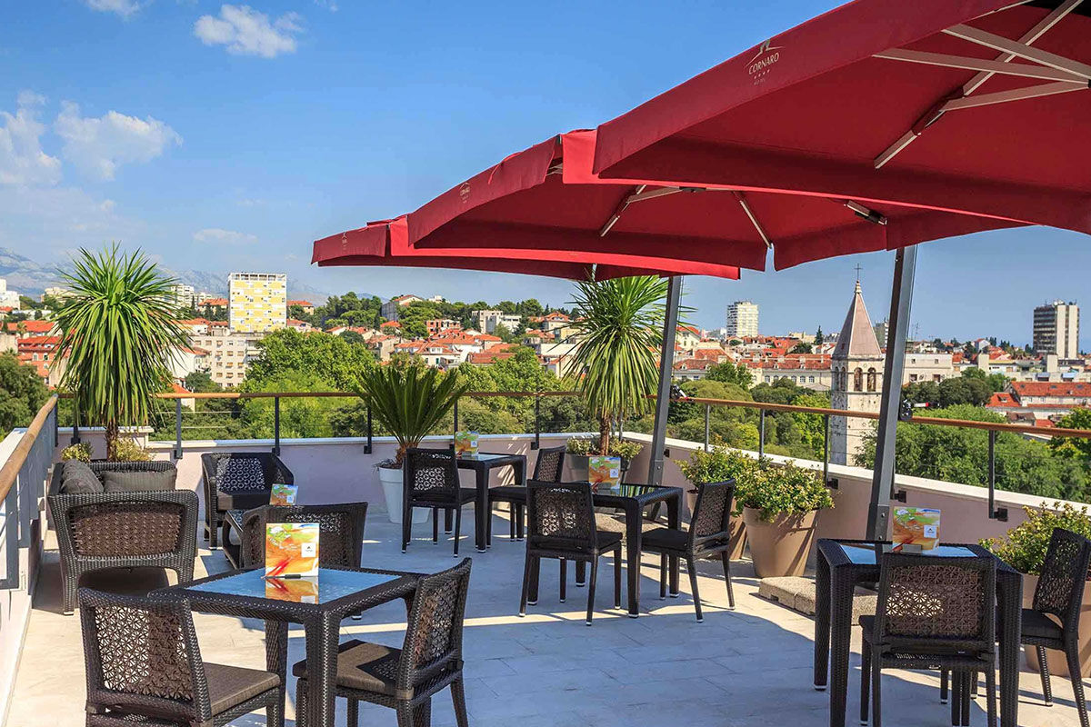 <b>Hotel Cornaro</b> - A pink palace with a rooftop terrace featuring some of the best views over Split’s Old Town, the Hotel Cornaro is both charming and polished. It features modern rooms with interesting artwork, indoor and outdoor dining, and is only a 3-minutes’ walk to UNESCO-protected Diocletian’s Palace.