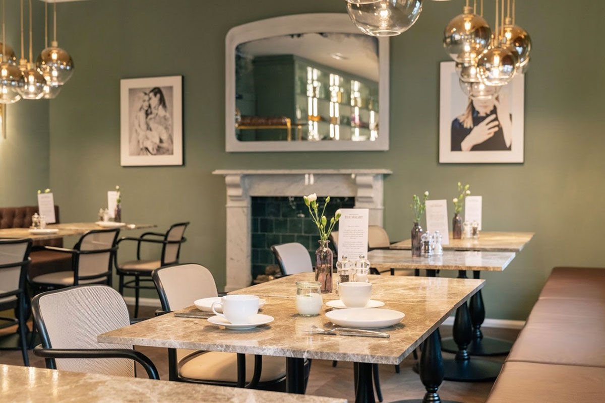 <b>Hotel Mozart</b> - Warm, with sage-colored walls throughout, the Hotel Mozart is relaxed, trendy and charming with its hardwood floors, and orb lighting. Guests enjoy the 10-minute walk into the historic Old Town to explore Salzburg and its sights.