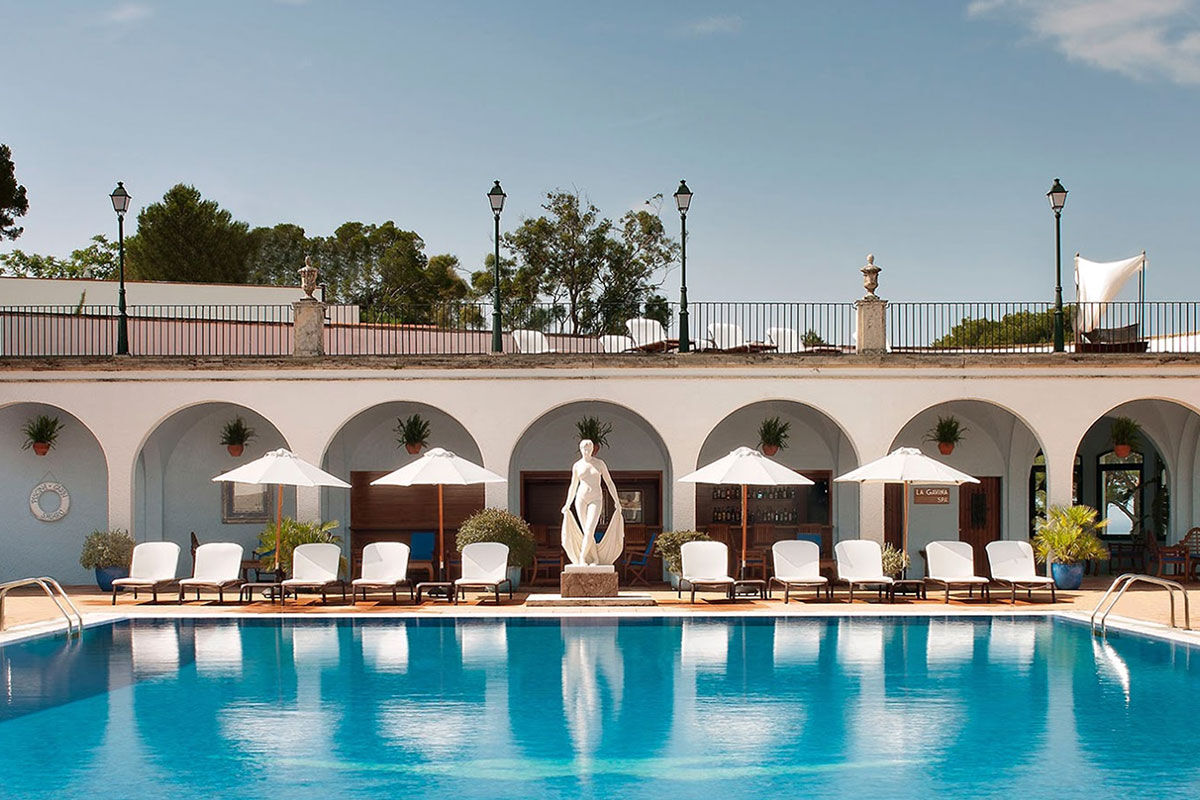 <b>Hostal de La Gavina, Girona</b> - Right around the corner from Salvador Dali’s birthplace, Hostal de La Gavina is a stately hotel with four restaurants, two bars, a pool and spa as well as tennis courts for your enjoyment. If you’re feeling up for a beach day, the Sant Pol Beach on the Mediterranean Sea is only a 3-minute walk away!