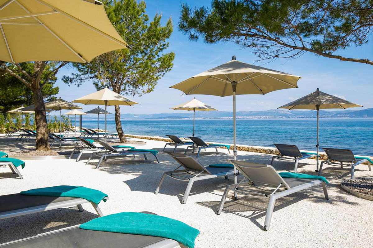 <b>Hotel Lemongarden, Brac</b> - Located right on the harbor of Sutivan, the Hotel Lemongarden is comprised of multiple 300-year-old stone houses with ample space to ensure a peaceful stay. This hidden gem is an adults-only property that features a private beach area, a pool nestled within a lush sculptured garden, and a dining room colored in yellow and lime - making nods to the hotel’s name.