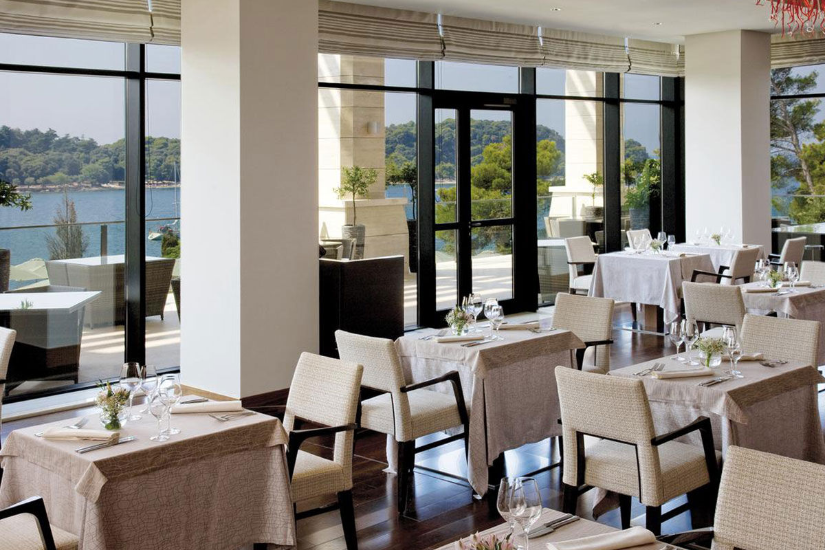 <b>Hotel Monte Mulini</b> - Set in a protected ancient forest overlooking the Adriatic Sea, the Hotel Monte Mulini is a luxury resort with only a 15-minutes’ walk into Rovinj’s city center. There’s a refined European restaurant, a glass-enclosed Mediterranean eatery, 4 outdoor pools, a bar with sea views and direct beach access for guests to take advantage of.