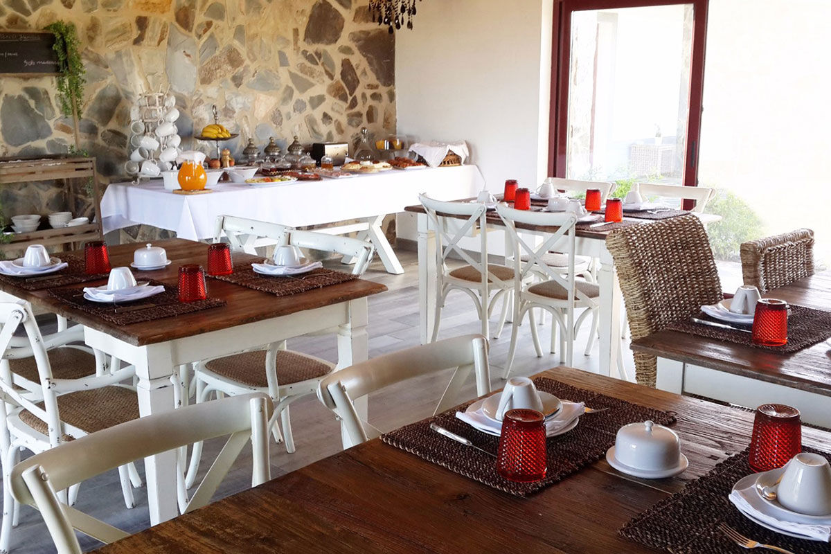 <b>Monte do Cardal, Odeceixe</b> - Cheery and bright, the Monte do Cardal is a boutique resort with pink hues and stripes pairing throughout. Lounge in the sun by the pool or admire the garden while sipping a refreshing drink before retreating to your county-chic room for a good night’s rest.