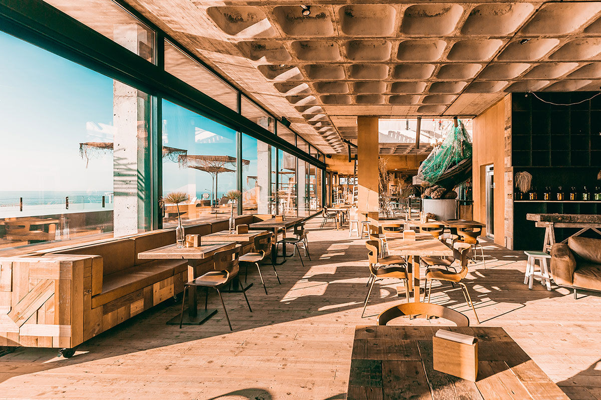 <b>Noah Surf House, A dos Cunhados</b> - Sitting on Praia da Fisica in Santa Cruz, this industrial-chic hotel lives in respect and consonance with nature. With its focus on the Atlantic Ocean, the Noah Surf House is a gathering place for travelers who love to surf, skateboard, adventure and appreciate a crackling fire with friends.