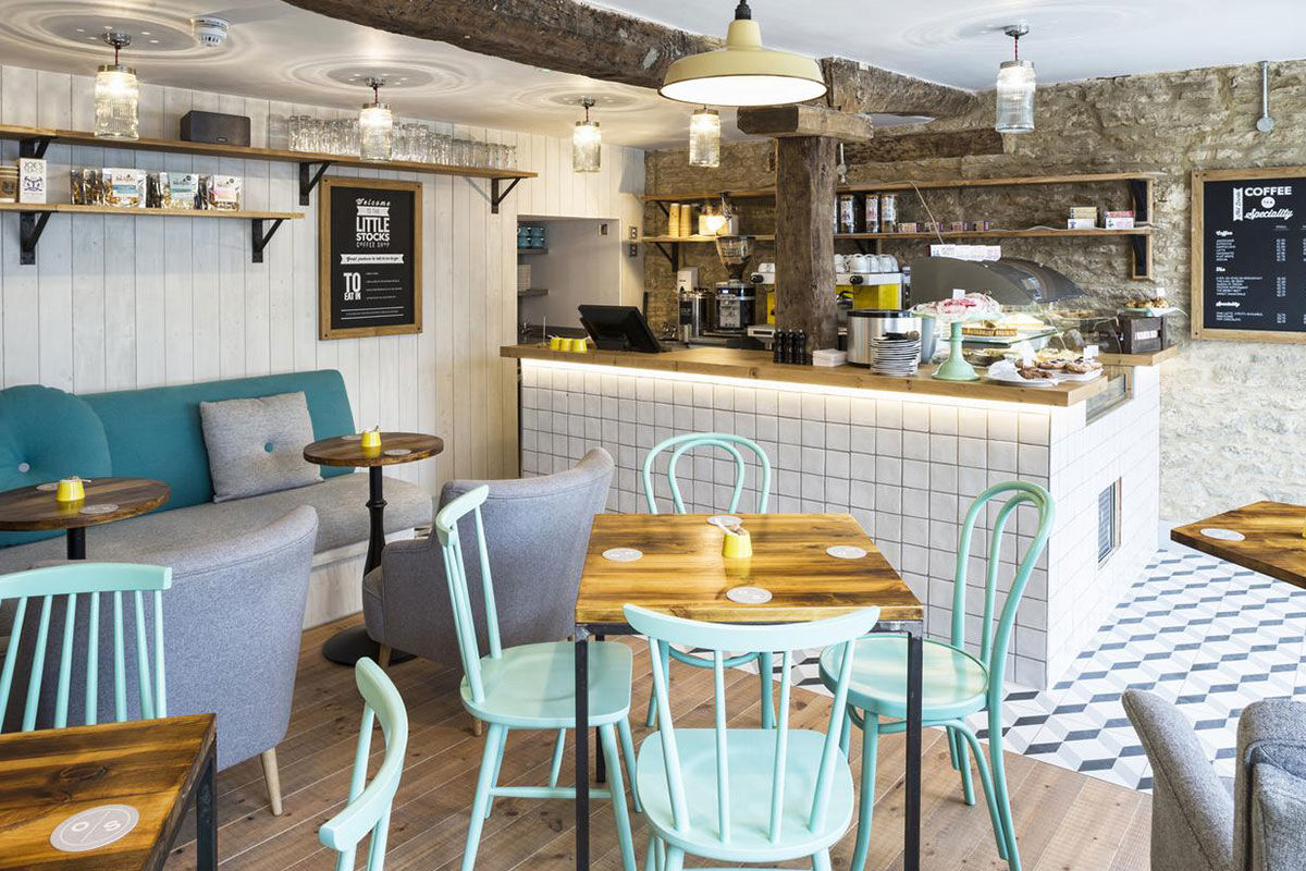 <b>The Old Stocks Inn, Stow-on-the-Wold</b> - This 17th century coaching inn set in Stow-on-the-Wold’s historic market square has been refurbished into a boutique hotel with character and charisma. There’s a historic pub with exposed oak beams and a log fireplace along with an English patio garden and vibrant detailing.