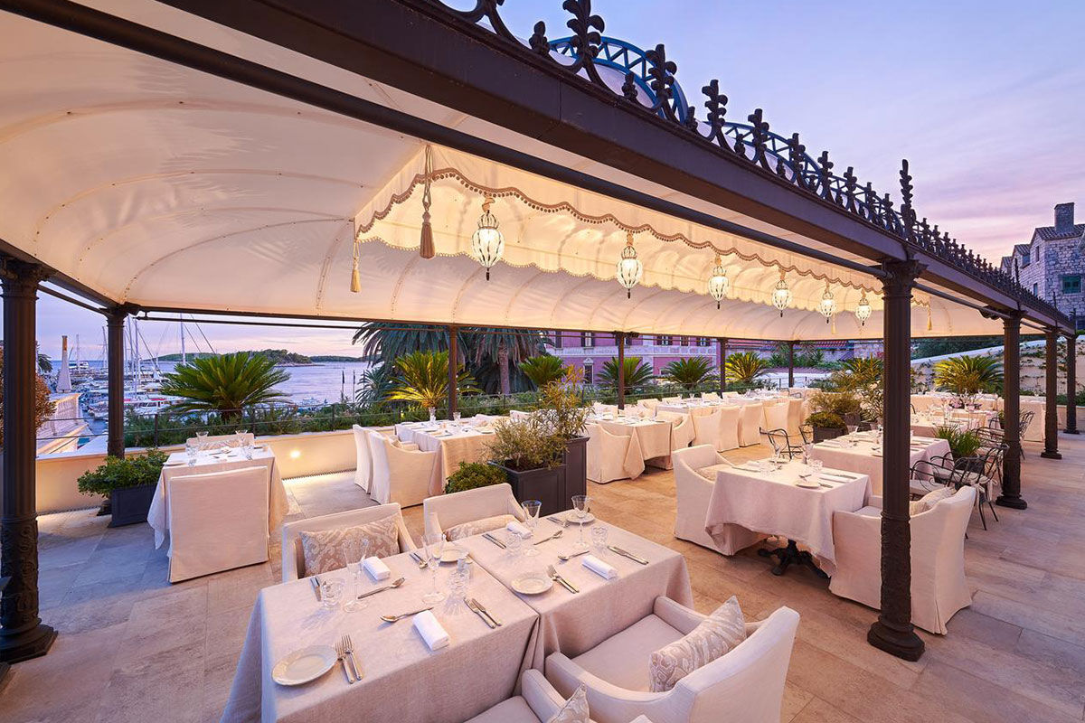 <b>Palace Elisabeth, Hvar</b> - Set in a stately building from 1869, this genteel hotel sits on a cobbled square facing the Port of Hvar. Palace Elisabeth quietly boasts of its upscale Italian restaurant that offers panoramic views, its outdoor terrace lounge with plush seating, as well as the courtyard pool to which guests retreat after a drink at the refined bar.