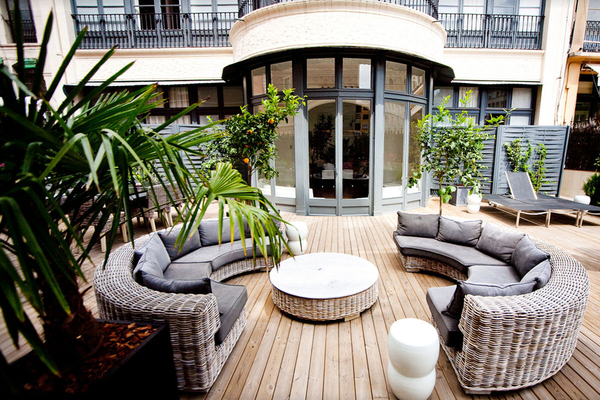 <b>Praktik Rambla</b> - With only a 5-minute walk to the Plaza Catalunya and Las Ramblas, this townhouse hotel features mosaic floors and molded ceilings, making for an overall Gothic façade. There’s an outdoor terrace with a fountain and couches for guests to reflect on the day.