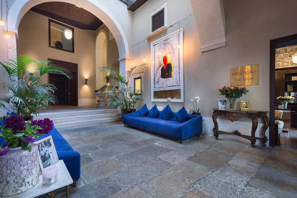 <b>Santiago de Alfama</b> - Within a former palace from the 15th century, this charming boutique hotel is a 9-minute’ walk to the Castelo de Sao and a 13-minute walk to the waterfront plaza Terreiro do Paco. The restaurant serves regional cuisine, the terrace is elegantly furnished, and the rooms have wood floors and paneled ceilings, giving it an overall classic feel.