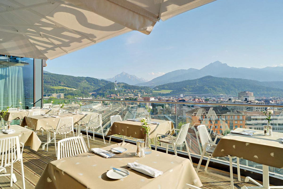 <b>Adlers Hotel Innsbruck</b> - Enjoy panoramic views of the city and Tyrolean Alps from this alpine-urban styled hotel in downtown Innsbruck. With newly designed rooms, a Turkish steam bath and sleek rooftop terrace, guests are rejuvenated to venture out and explore.