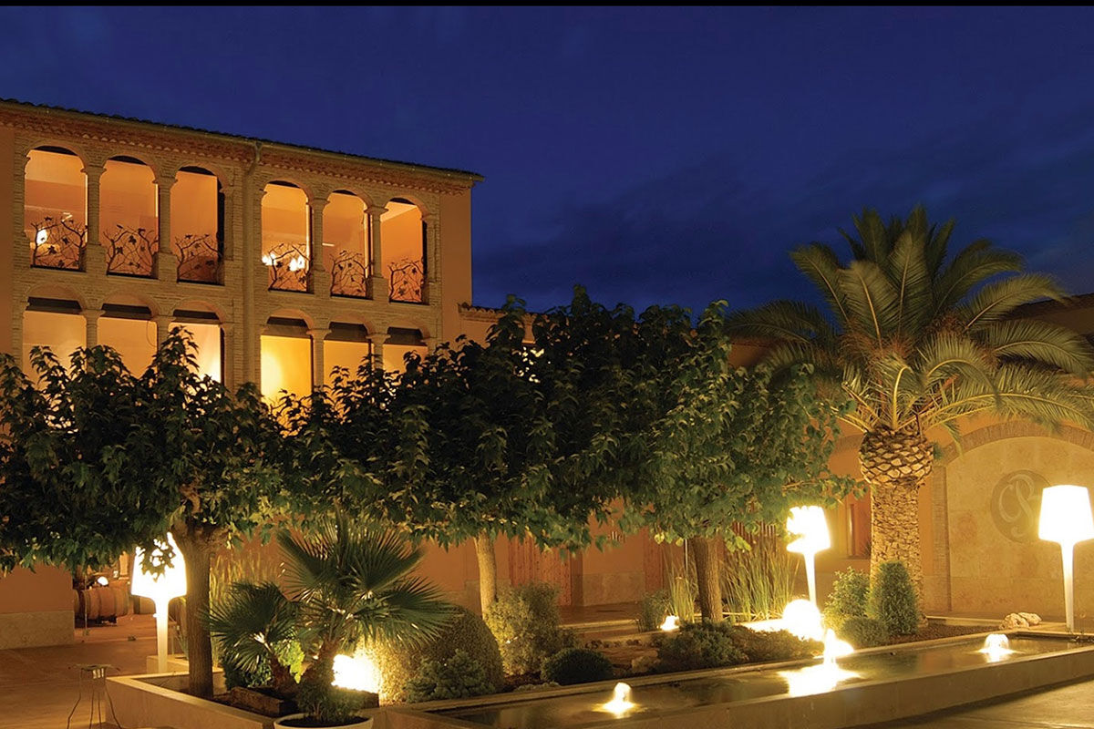 <b>Can Bonastre Wine Resort, Masquefa</b> - Boasting over 460 years of wine history and set in a 16th century farmhouse, the Can Bonastre Wine Resort sits below the Monteserrat mountain range and is surrounded by vineyards. Wander from your polished room, head past the chic spa and sauna, meander through the landscaped gardens, and arrive just in time for your wine tasting tour.