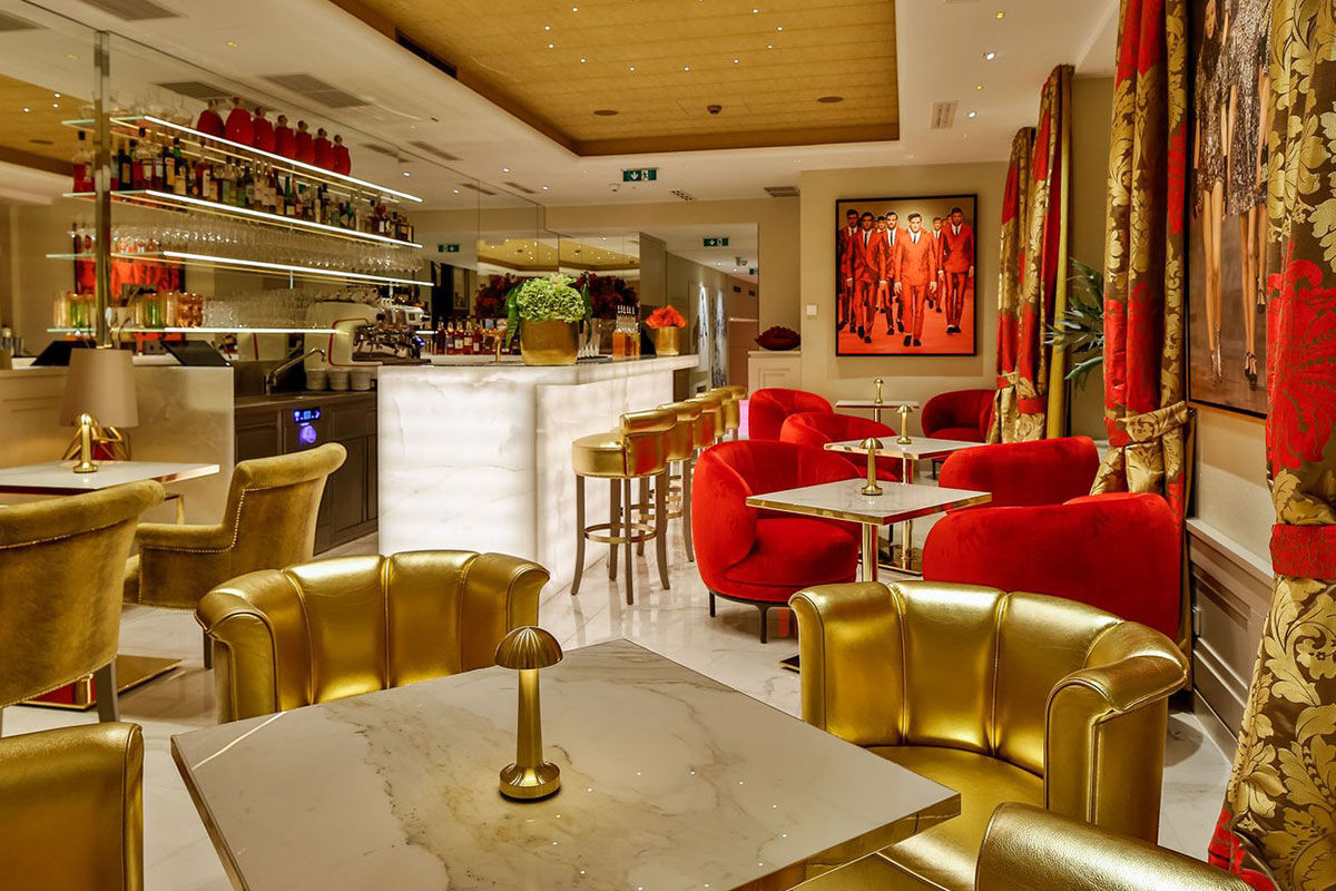<b>Hotel Das Tyrol</b> - Shimmering gold and red velvet chairs reign at the Hotel Das Tyrol, along with original artworks by contemporary artists. This mod-chic hotel features a gold-tiled spa with a sauna and is a 13-minute stroll to the Hofburg Imperial Palace.