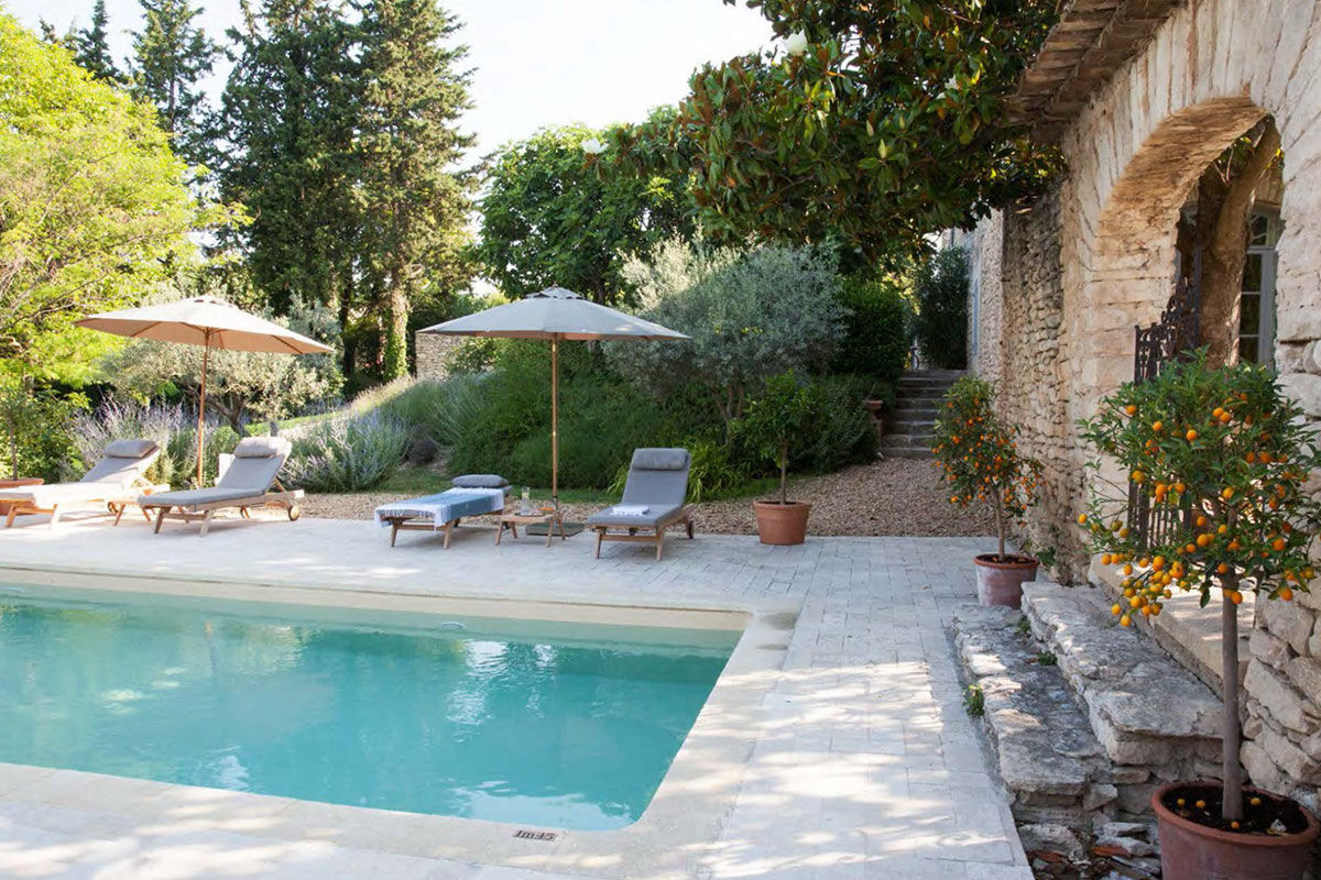 <b>Domaine Les Martins, Gordes</b> - Guests fall in love with this quaint B&B with its stonework, shutters and climbing vines. The Domaine Les Martins is a quiet retreat featuring a Provencal-style garden, two shaded courtyards and a heated outdoor saltwater pool.