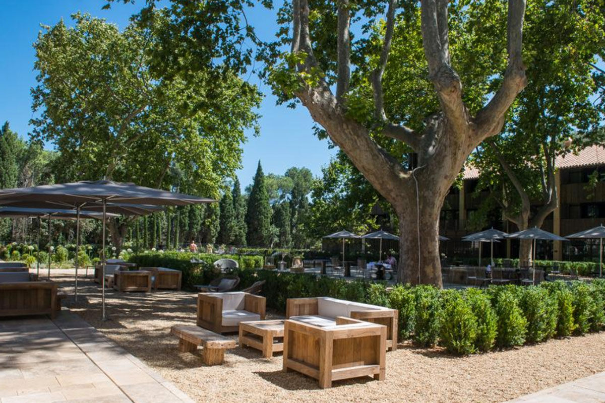 <b>Domaine de Manville, Les Beaux de Provence</b> - Wander around the stone fountain after enjoying a formal meal on the outdoor terrace, soak in the pool surrounded by lush shrubbery, or head to the eco-responsible golf course for a couple of rounds. The Domaine de Manville is a genteel hotel that offers guests a relaxing escape on its 100-acre estate.