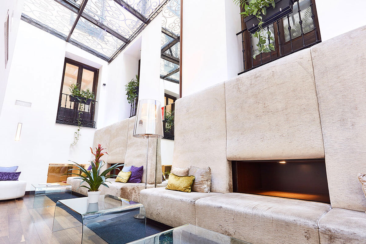 <b>Hotel Hospes Puerta de Alcala</b> - Within Madrid’s Salamanca district, the Hotel Hospes Puerta de Alcala is located in an 1883 building right next to the Puerta de Alcala; guests can dine right in front of it at the Malvar Restaurant. The stylish hotel also features a spa, hammam and relaxation pool.