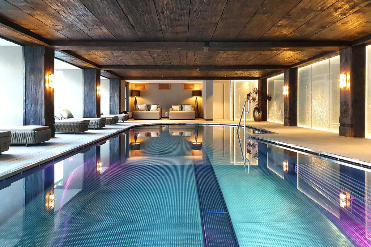 <b>Hotel Alpenhof</b> - With dark wood-beamed ceilings, rustic-chic rooms, piano bar and cigar lounge, this handsome hotel sits at ease amidst the Swiss Alps with views of Matterhorn. Family-run and only a 5-minutes’ walk to downtown Zermatt, this chalet-style hotel is the perfect, upscale cabin-like feel for your rugged mountain stay.