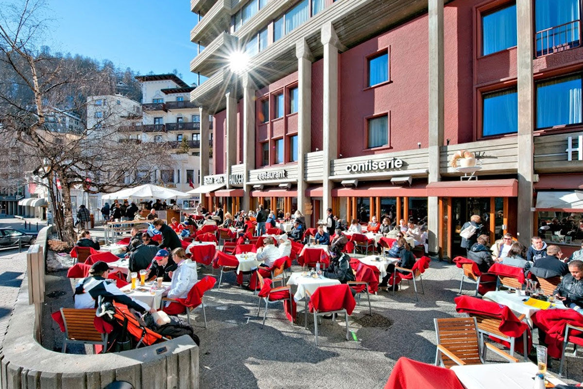 <b>Hotel Hauser</b> - Family-run since 1955, the Hotel Hauser is famous for its fine homemade confectionary and desserts. In the heart of St. Moritz, this blush-colored boutique hotel offers mountain views, contemporary and minimalist rooms, as well as a friendly restaurant and terrace bar.