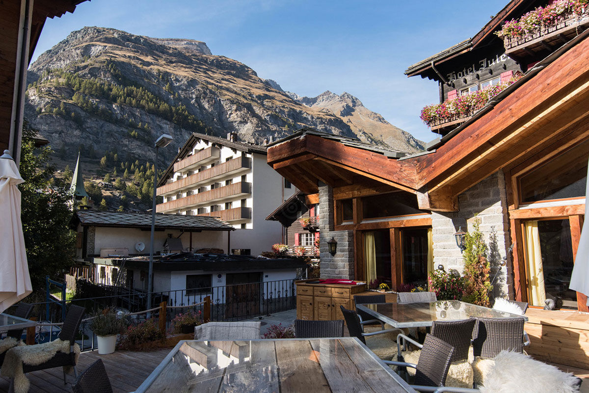 <b>Hotel Julen</b> - With Views over Matterhorn and the Swiss Alps, Hotel Julen is family-run and inviting. Experience an authentic Swiss Alp vacation with alpine rooms, farmhouse décor, spa and traditional Swiss food.