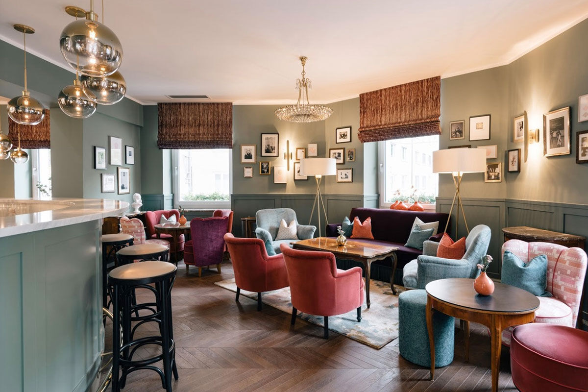 <b>Hotel Mozart</b> - Warm, with sage-colored walls throughout, the Hotel Mozart is relaxed, trendy and charming with its hardwood floors, and orb lighting. Guests enjoy the 10-minute walk into the historic Old Town to explore Salzburg and its sights.