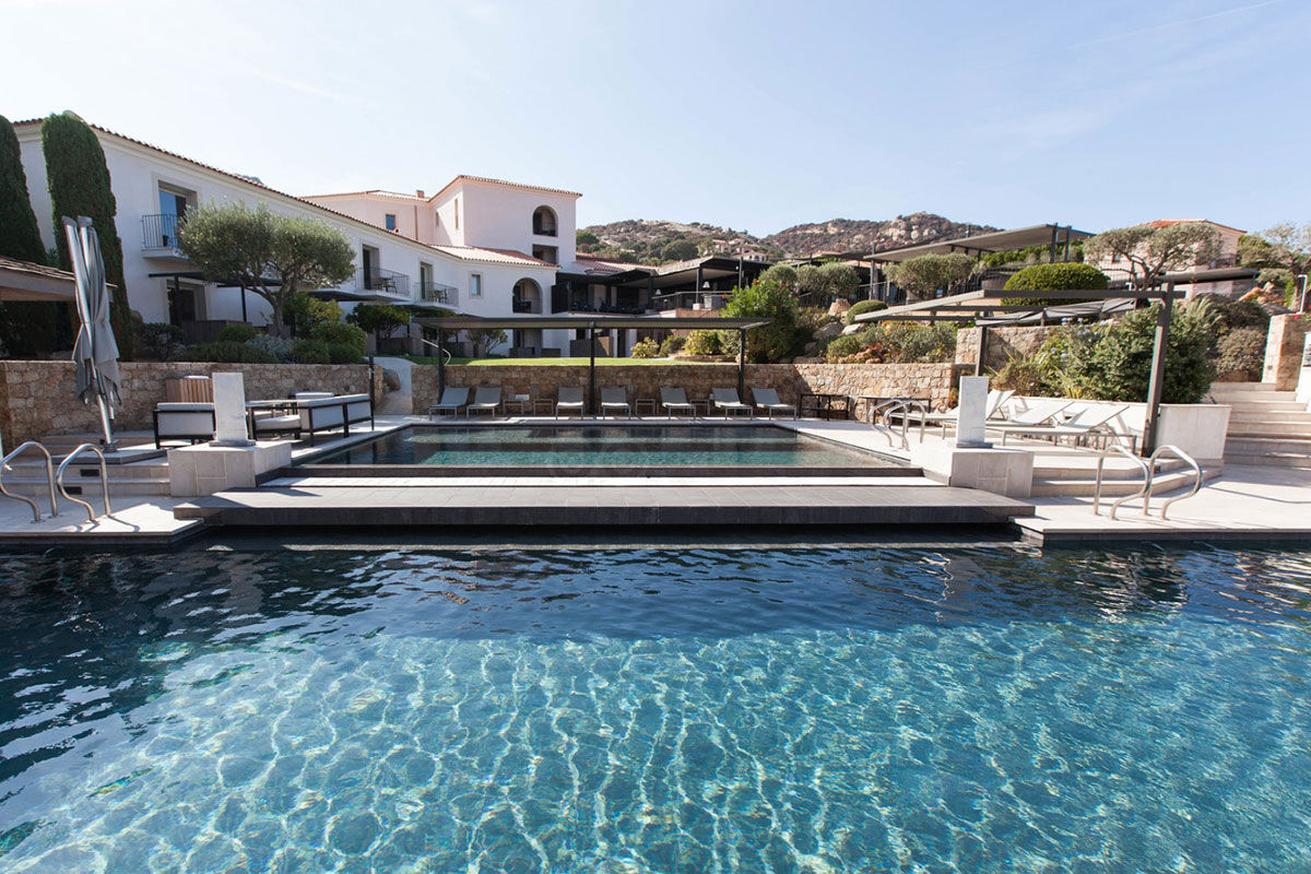 <b>La Villa Calvi, Calvi</b> - Nestled on the heights of Calvi, this elegant hotel is a retreat with a view. With five pools, two fine dining restaurants and a poolside bar, this classically modern hotel awaits its guests with open arms.