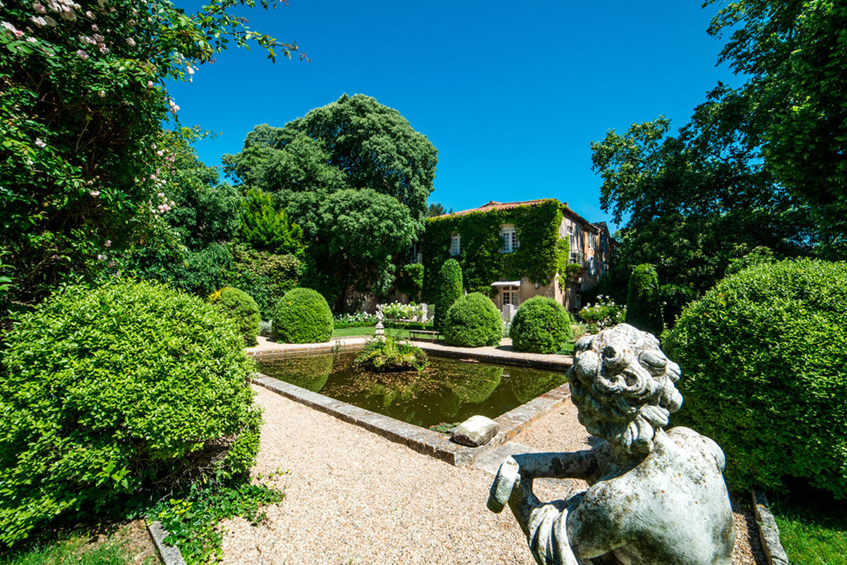 <b>Hotel Baumaniere, Les Baux de Provence</b> - With a 2-Michelin star restaurant, spa with hammam, tennis court, lounge-bar, pool and bike rental on site, the Baumaniere is full of activity. The rooms are modern, yet Provencal, the gardens and ponds are charming, and the boutique sells local products to savor.