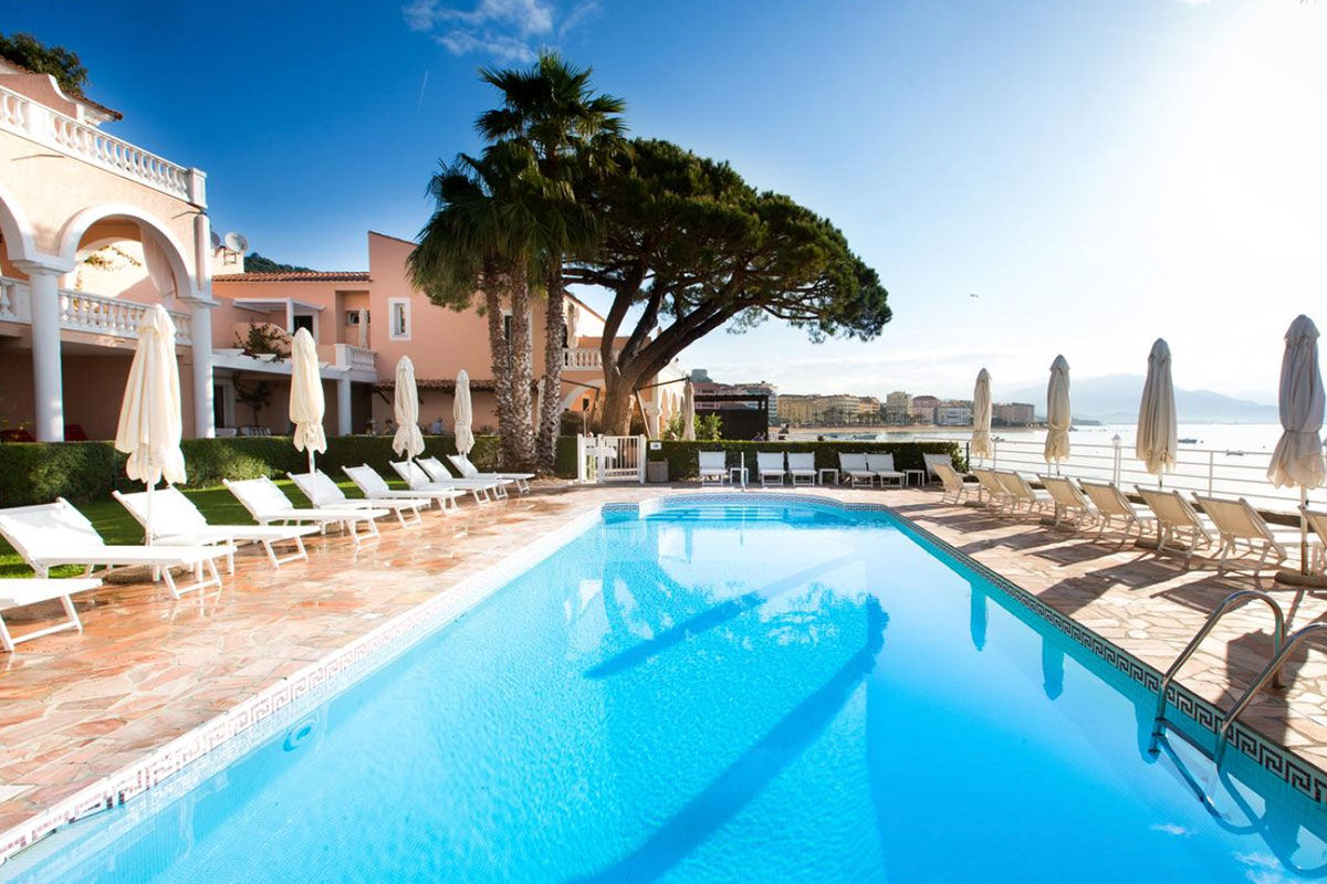 <b>Hotel Les Mouettes, Ajaccio</b> - Set right on the coast of the Gulf of Ajaccio, this pink palace has a private beach, heated saltwater pool and snorkeling gear available for guests. There’s also a lounge, cocktail bar and spa treatments offered on the rooftop terrace.