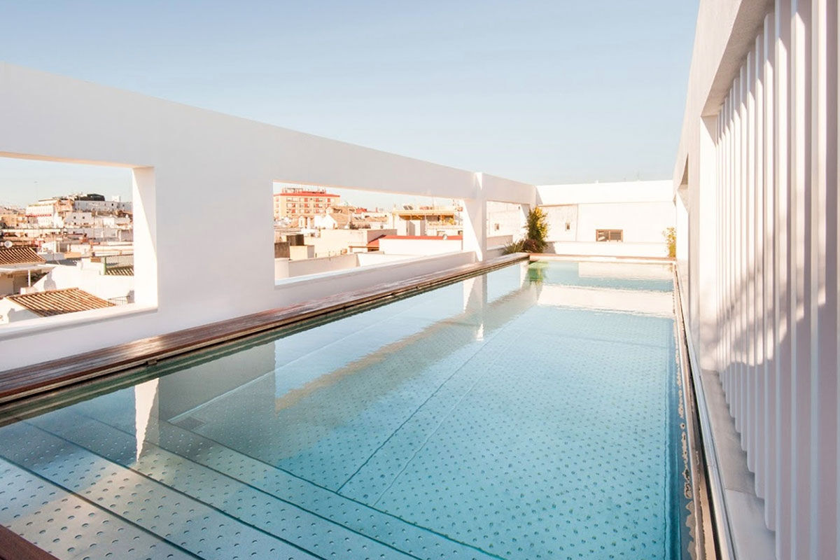 <b>Mercer Hotel Sevilla</b> - Tucked away on a narrow cobblestone street, the Mercer Hotel is set in a restored 19th century palace with polished rooms, a rooftop terrace, and plunge pool. A main draw of this boutique hotel is a grand lounge in an Andalusian courtyard featuring an original staircase; the chic cocktail bar and haute restaurant are added bonuses.