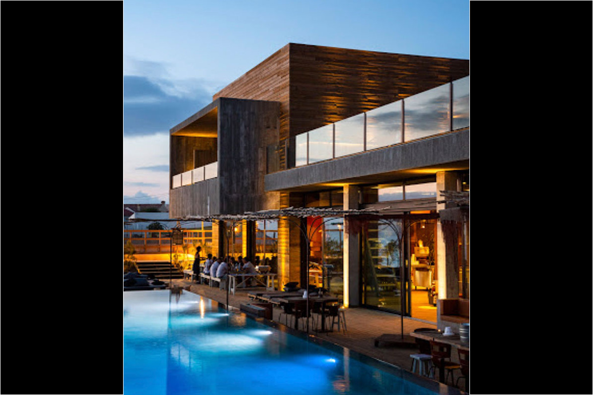 <b>Noah Surf House, A dos Cunhados</b> - Sitting on Praia da Fisica in Santa Cruz, this industrial-chic hotel lives in respect and consonance with nature. With its focus on the Atlantic Ocean, the Noah Surf House is a gathering place for travelers who love to surf, skateboard, adventure and appreciate a crackling fire with friends.