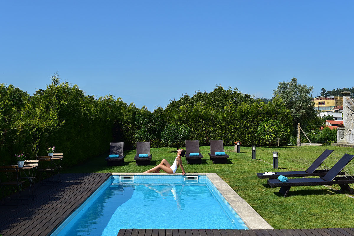 <b>Solar Egas Moniz - Charming House & Local Experiences, Paco de Sousa</b> - This manor-house hotel shows off its sophistication with a stained-glass window, climbing vines, and a wine bar. The rooms are individually decorated with murals, the library has a wood-burning stove and the garden is home to a swimming pool and a kids’ playground.