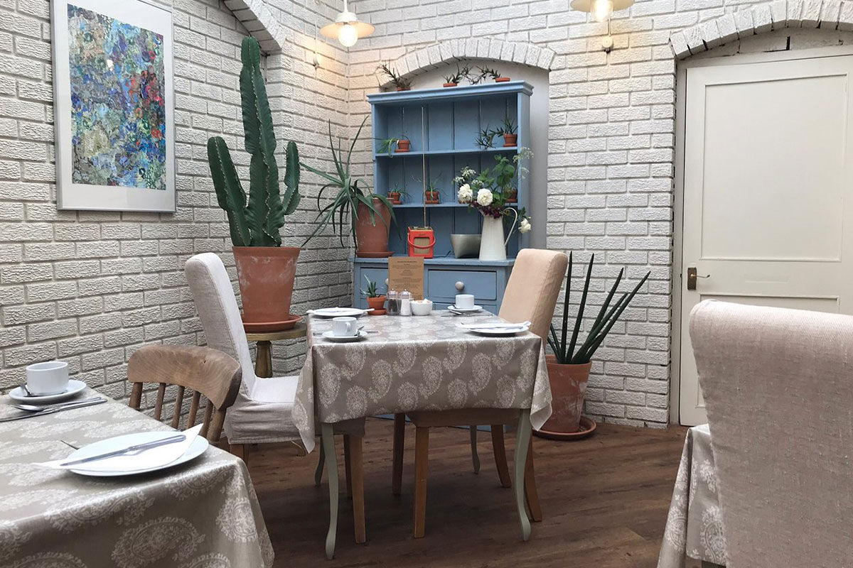 <b>The Parisi Hotel</b> - Only a 6-minute walk to The Shambles (a popular shopping street with timber-framed buildings), this converted rectory from the Victorian era is now a contemporary hotel overlooking the Church of St. Denys. With a library lounge and a garden with seating, this boutique hotel is cozy, bright and features colorful paintings throughout.