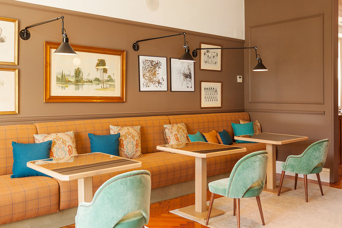 <b>Villa Soro, Donostia</b> - Close to Zurriola beach and San Sebastian Cathedral, Villa Soro occupies two buildings, one of which was built in 1898 and is a Historical Heritage Building of San Sebastian. In that building, the main hallway features a grand stairwell with a stained-glass window and marble floors; the rooms are refined with much natural light. The property boasts a wood-paneled bar and lounge.