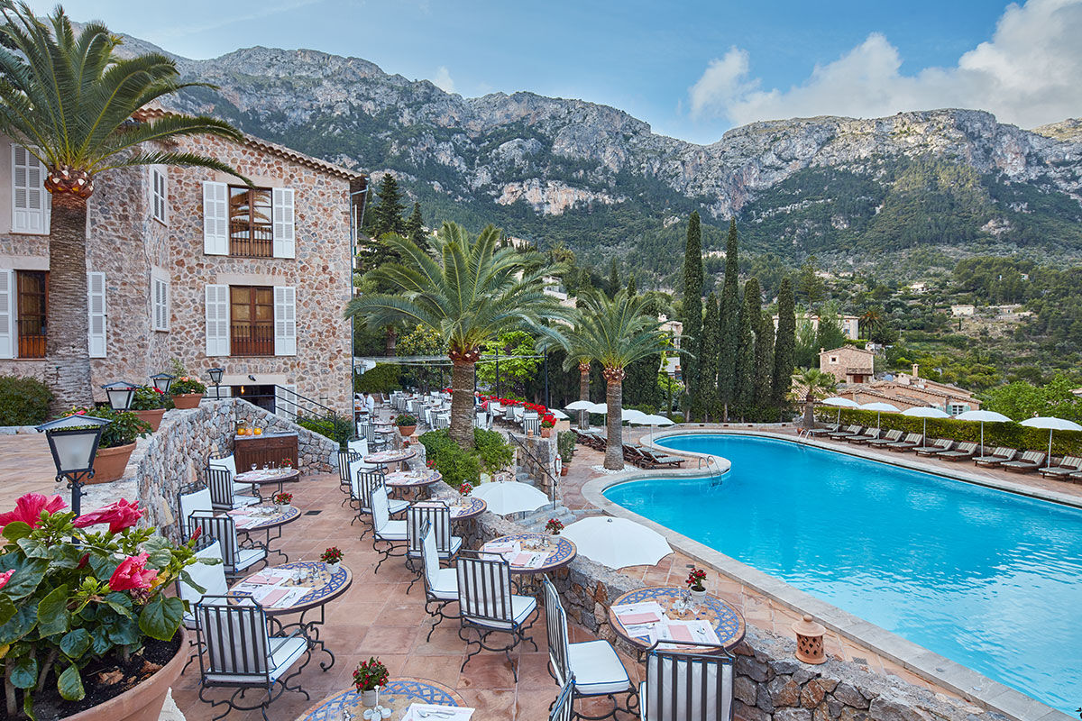 <b>Belmond La Residencia, Mallorca</b> - An 8-minute walk to La Casa de Robert Graves, this Mallorcan-chic hotel is comprised of two stone manor houses with old-school charm and antiques. There are 3 restaurants on site as well as a bistro/bar, tennis courts, and a spa with a sauna.