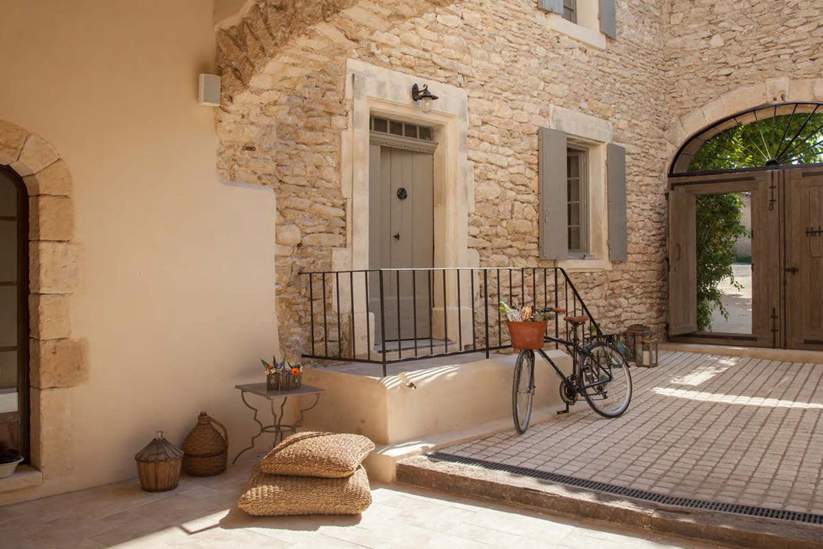 <b>Domaine Les Martins, Gordes</b> - Guests fall in love with this quaint B&B with its stonework, shutters and climbing vines. The Domaine Les Martins is a quiet retreat featuring a Provencal-style garden, two shaded courtyards and a heated outdoor saltwater pool.