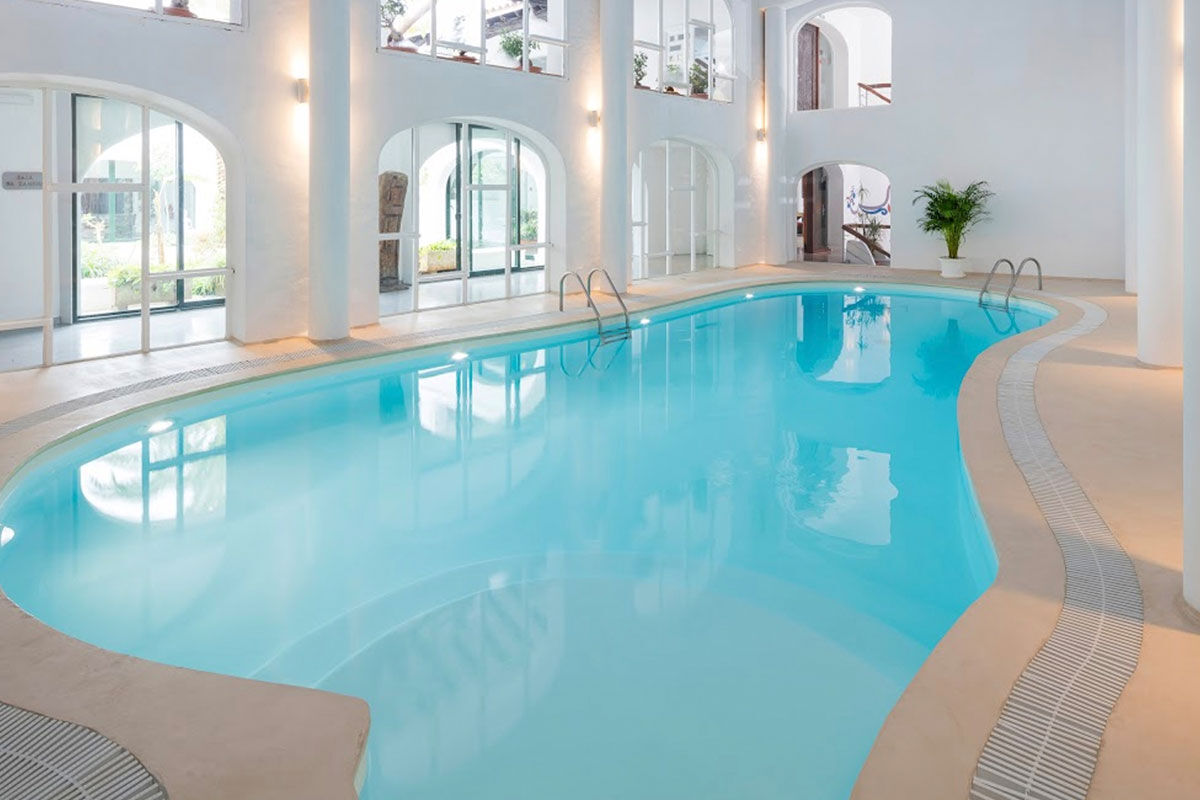 <b>Hacienda Na Xamena, Ibiza</b> - Removed from the clubbing areas of the island, Hacienda Na Xamena is an oasis to rejuvenate your body and overall well-being. The rooms are airy with incredible views, the restaurant and bar have lush plants throughout, and the combination of exposed wood and white-washed walls brings a feeling of freshness to your senses.