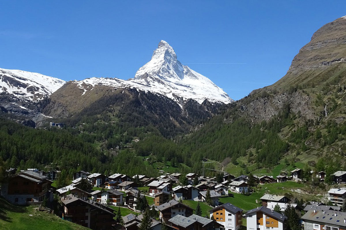 <b>Hotel Alpenhof</b> - With dark wood-beamed ceilings, rustic-chic rooms, piano bar and cigar lounge, this handsome hotel sits at ease amidst the Swiss Alps with views of Matterhorn. Family-run and only a 5-minutes’ walk to downtown Zermatt, this chalet-style hotel is the perfect, upscale cabin-like feel for your rugged mountain stay.