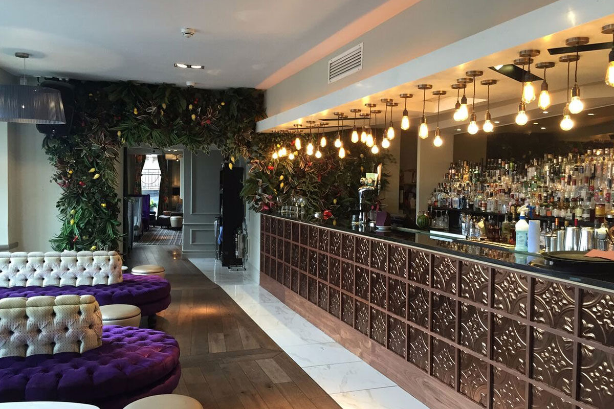 <b>Hotel Indigo Princes Street</b> - Close to museums and castles, this genteel hotel features dark wood, leather and aged photographs throughout, making you feel like you stepped into a moody upscale pub for a delicate cocktail. With tufted furnishings and modern touches, the Hotel Indigo Princes Street is the perfect match of traditional period pieces and contemporary details.